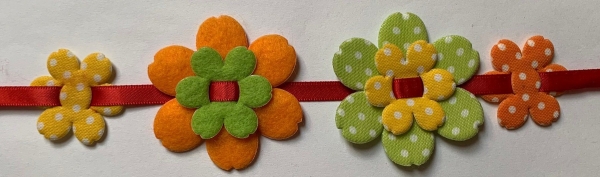 Stoff-Filz Blume Grandiosa, grün mit weissen Tupfen